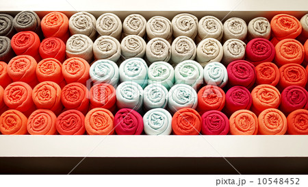 T-shirt rolled in shelf, Abstract background T-shirt rolled in shelf, Abstract background 10548452