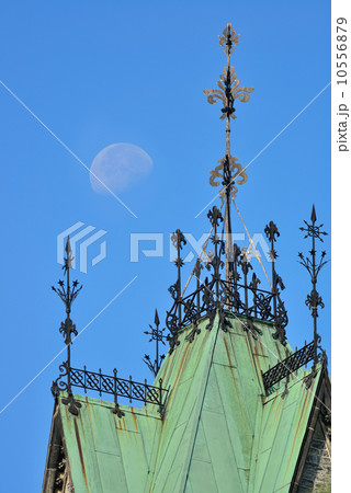 Old building roof and moon 10556879