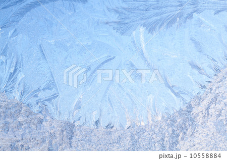 Rime on frosted window glass 10558884