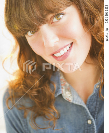 Portrait of smiling young woman 10566183
