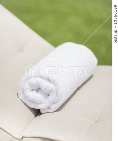 Folded towel on lounger 10566199
