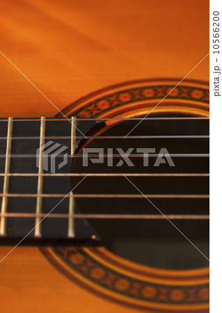 Close up of sound hole of acoustic guitar 10566200