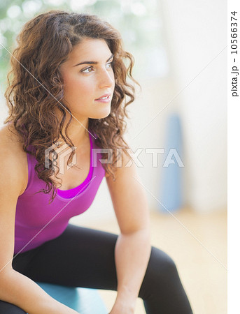 Woman exercising on fitness ball Woman exercising on fitness ball 10566374
