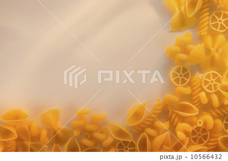 Variety of yellow pasta with blank white space in upper left corner Variety of yellow pasta with blank white space in upper left corner 10566432