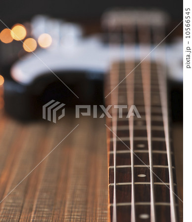 Close up of strings of bass guitar Close up of strings of bass guitar 10566545