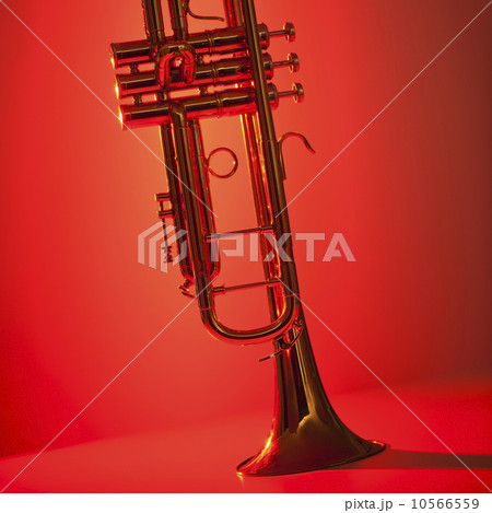 Close up of trumpet on red background 10566559