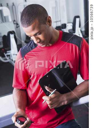 Athletic young man in gym Athletic young man in gym 10566739