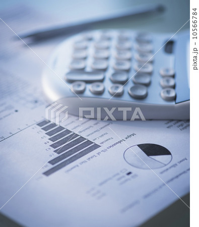 Studio Shot of calculator and paper material 10566784
