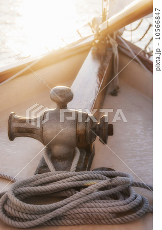 Rope coiled on yacht bow in sunset light 10566847