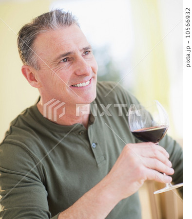 Portrait of man drinking red wine 10566932