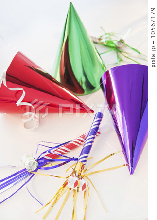 Party horn blowers and paper party hats 10567179
