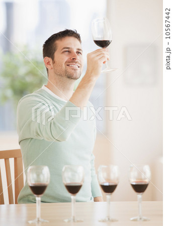 Man tasting wine 10567442