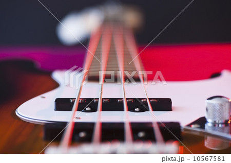 Close up of bass guitar Close up of bass guitar 10567581