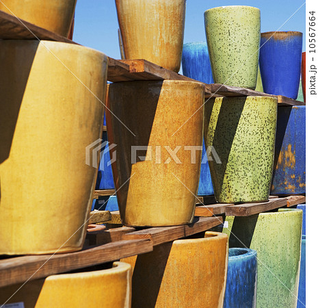 Stacks of glazed pottery vases 10567664