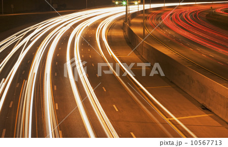 Blurred traffic headlights at night 10567713