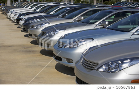 Row of new cars on lot Row of new cars on lot 10567963