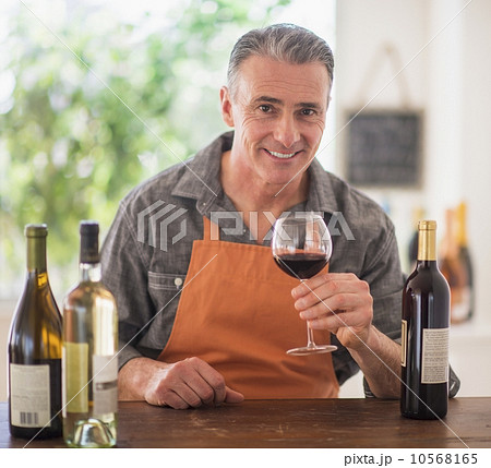 Portrait of man tasting wine Portrait of man tasting wine 10568165