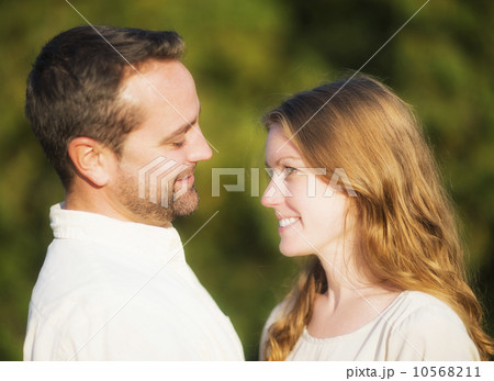 Couple smiling outdoors 10568211