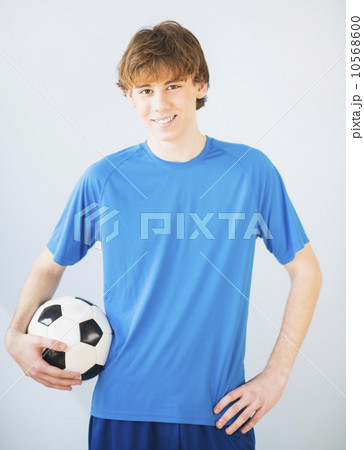 Teenage boy (14-15) with ball Teenage boy (14-15) with ball 10568600