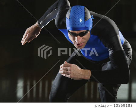 Male speed skater in ready position Male speed skater in ready position 10569183