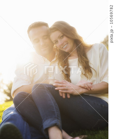 Couple embracing outdoors 10569782