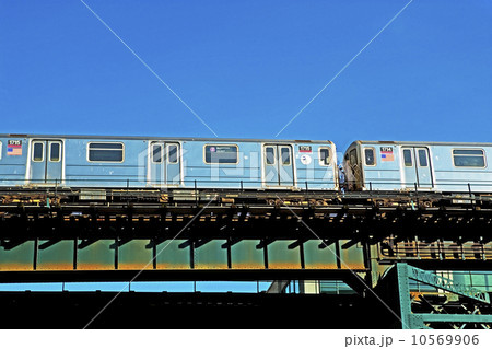 Elevated train under blue sky Elevated train under blue sky 10569906