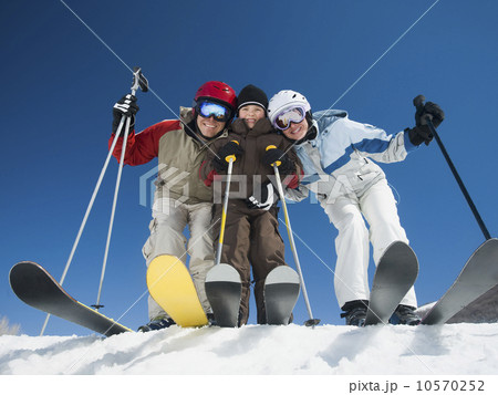 Family standing on skis Family standing on skis 10570252