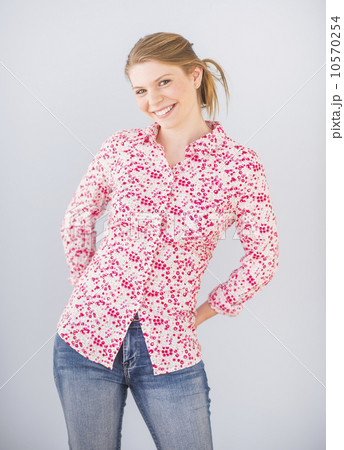 Woman with hands behind back 10570254