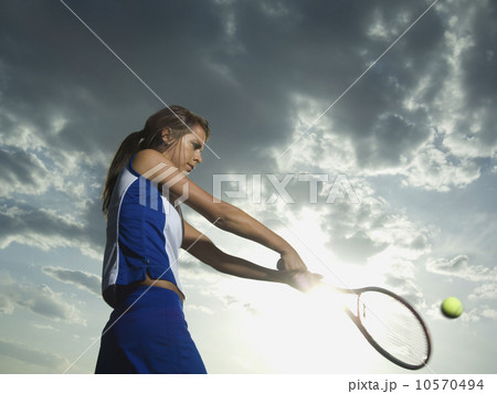 Low angle view of tennis player 10570494
