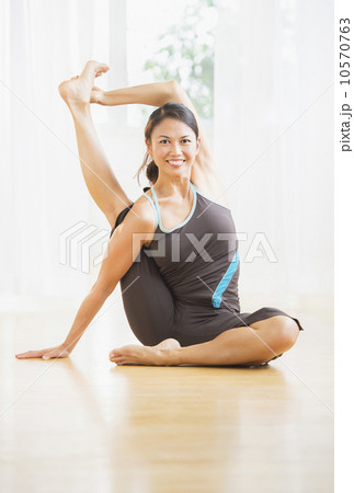 Mid adult woman practicing yoga 10570763