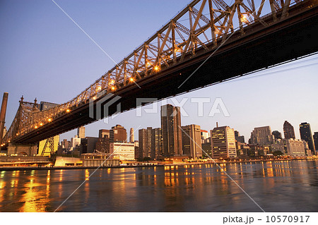 New York City skyline and bridge at night New York City skyline and bridge at night 10570917