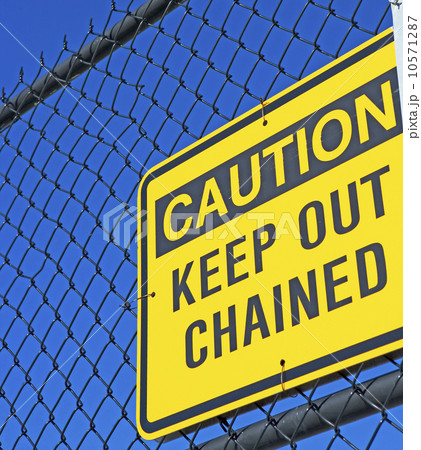 Caution Keep Out sign on fence Caution Keep Out sign on fence 10571287