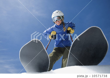 Low angle view of woman on skis 10571738