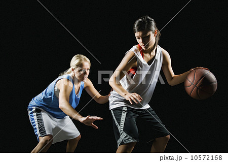 Two basketball players 10572168