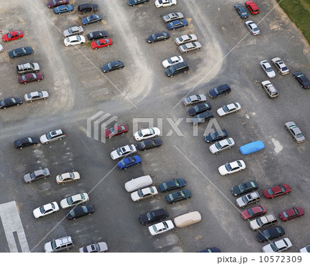 Aerial view of cars in parking lot 10572309
