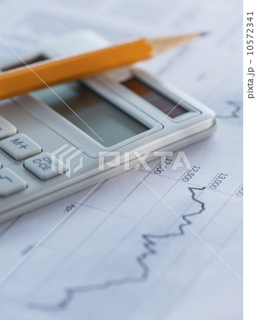 Studio Shot of calculator and paper material 10572341