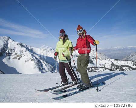 Women standing on skis, Wasatch Mountains, Utah, United States Women standing on skis, Wasatch Mountains, Utah, United States 10572396