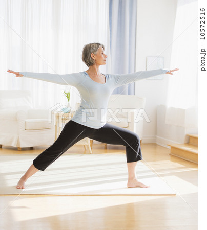 Portrait of woman practicing yoga Portrait of woman practicing yoga 10572516