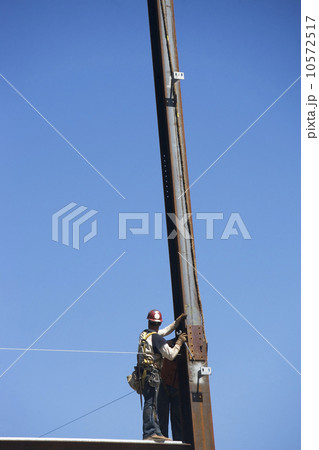 Construction workers on construction frame 10572517