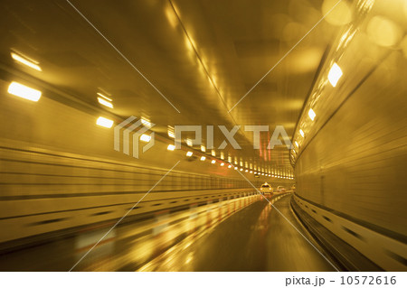 Cars driving in a tunnel 10572616