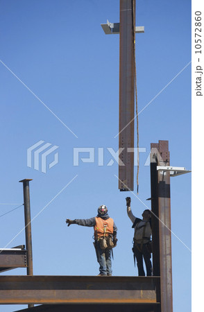 Construction workers on construction frame 10572860
