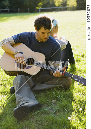 Man playing guitar Man playing guitar 10572873