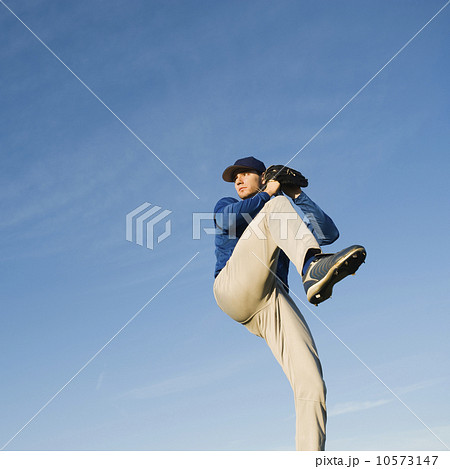 Baseball player throwing ball 10573147