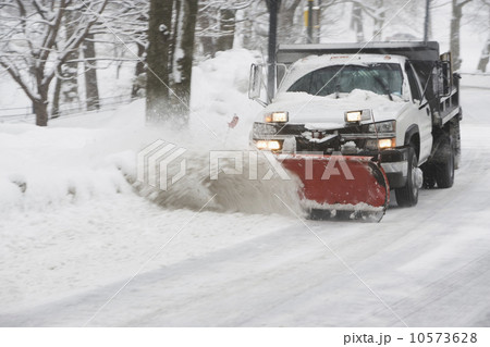 USA, New York City, snowplowing truck 10573628