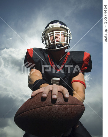 Low angle view of football player Low angle view of football player 10574464