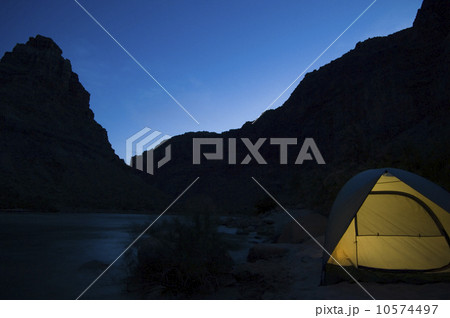 Tent next to river at night, Colorado River, Moab, Utah, United States 10574497
