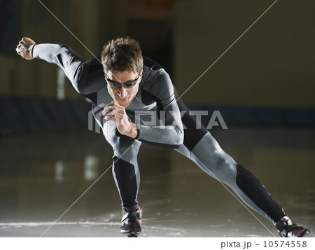 Male speed skater skating Male speed skater skating 10574558