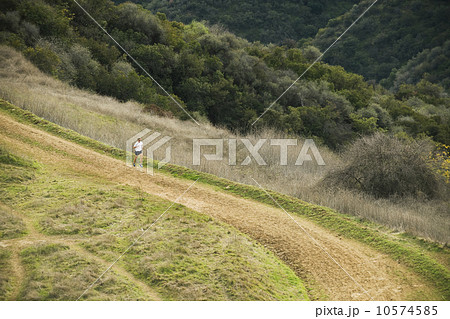 Person running on trail 10574585