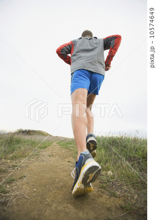 Person running on trail 10574649
