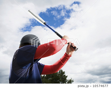Baseball player reading to swing bat 10574677